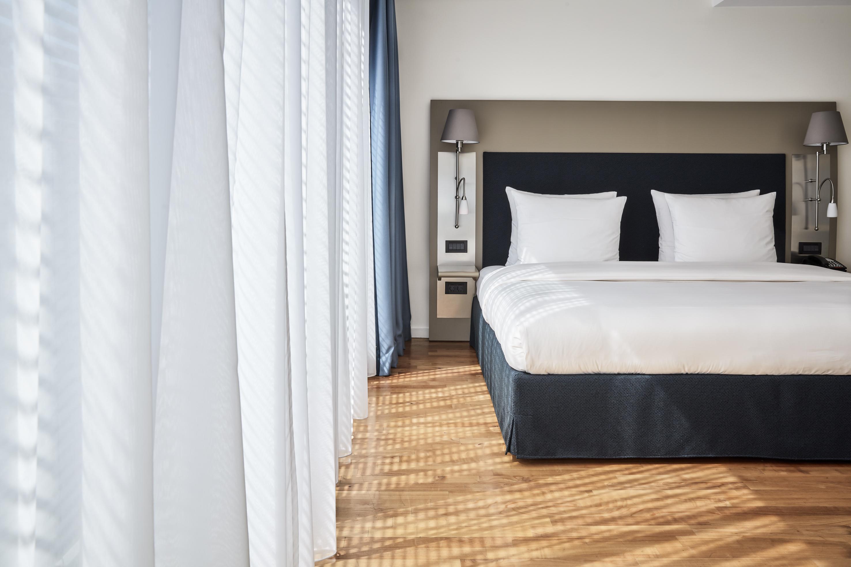 The Mandala Berlin, A Member Of Design Hotels Ngoại thất bức ảnh A bedroom at the hotel